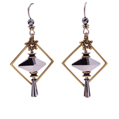 Dangle earrings made of Austrian crystal, handworked brass, glass and hematine. Titanium ear hooks. By Honica.