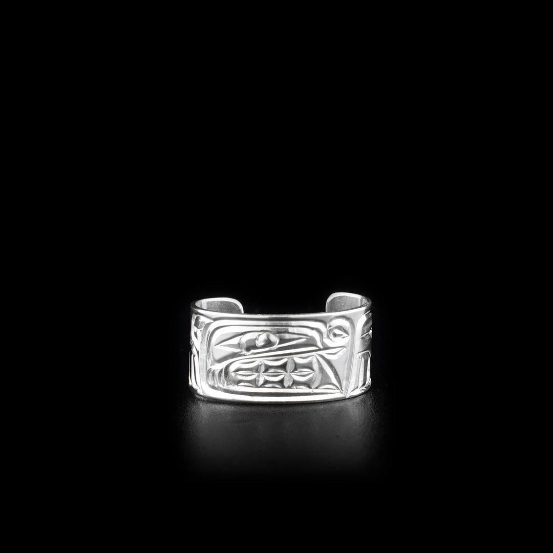 This sterling silver toe ring has a cuff band with a gap in the back. There is a depiction of the Bear that has been carved into the surface of the band.