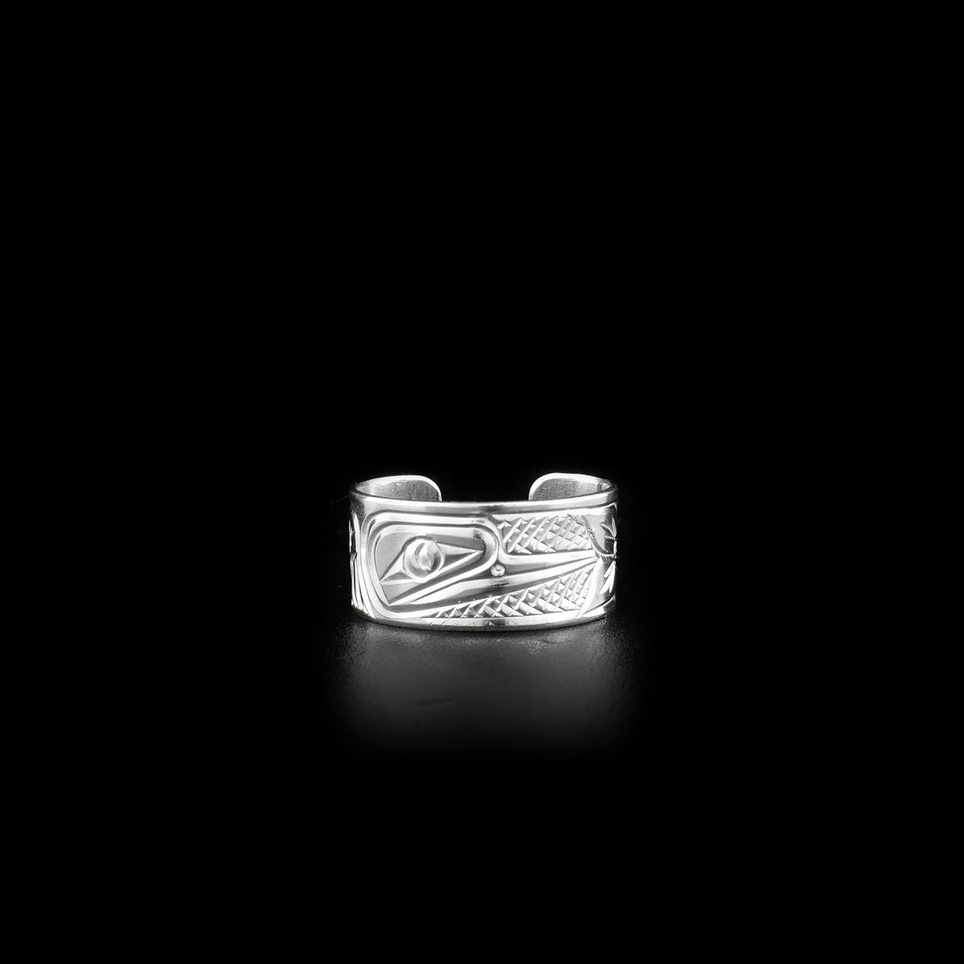 This sterling silver toe ring has a cuff band with a gap in the back. There is a depiction of the Bear that has been carved into the surface of the band.