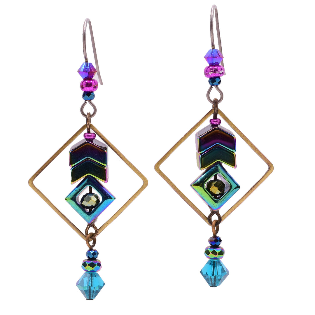 Dangle drop earrings made of Austrian crystal, hematine, handworked brass, and glass. Titanium hooks. By Honica.