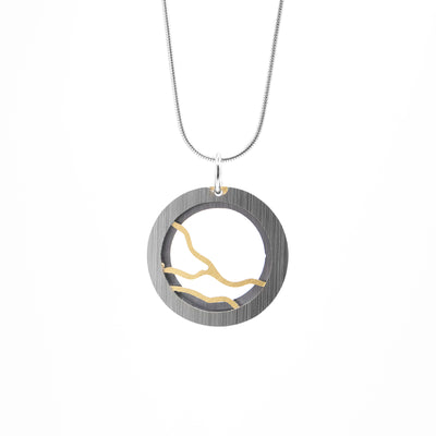 Brushed and anodized aluminum. Round, steel-coloured frame depicting horizontal yellow lightning streaks going across.