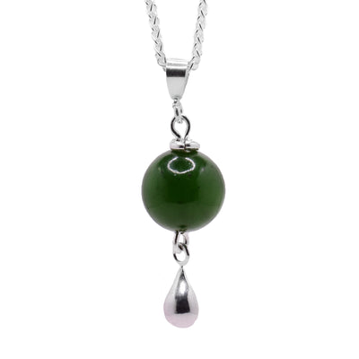 Round, BC jade bead with sterling silver teardrop hanging below.