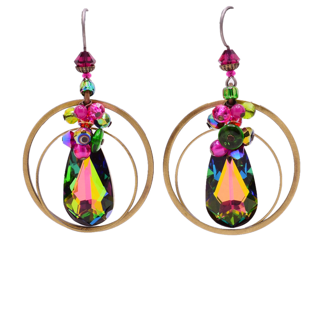Dangle earrings made of Swarovski crystal, handworked brass and glass. Titanium ear hooks. By Honica.