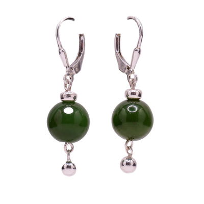 Sterling silver round grade A BC jade bead dangle earrings with round silver beads dangling below. Lever back hooks.