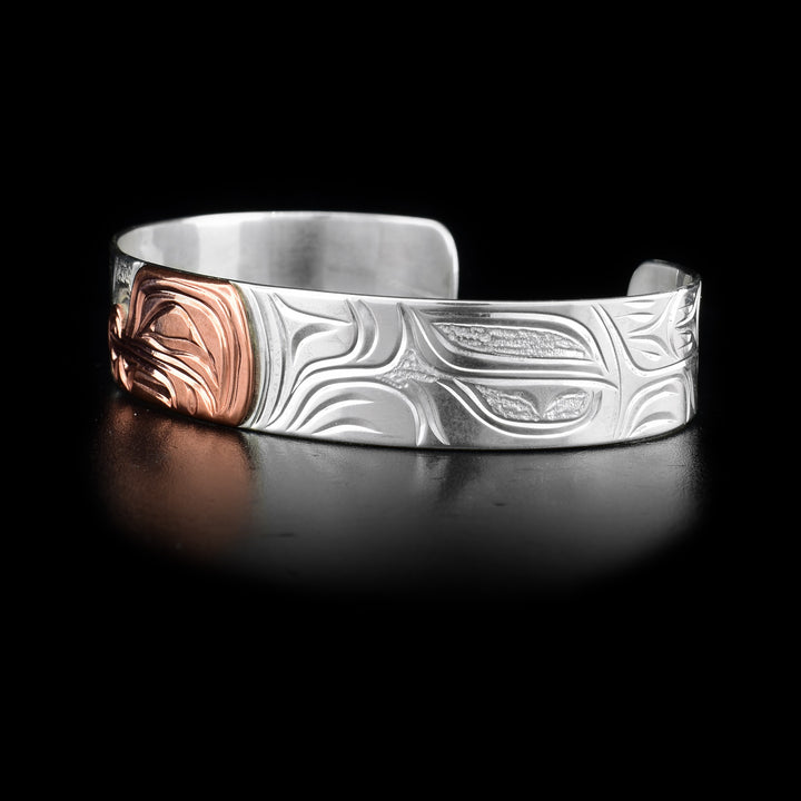 Left side with carved designs.