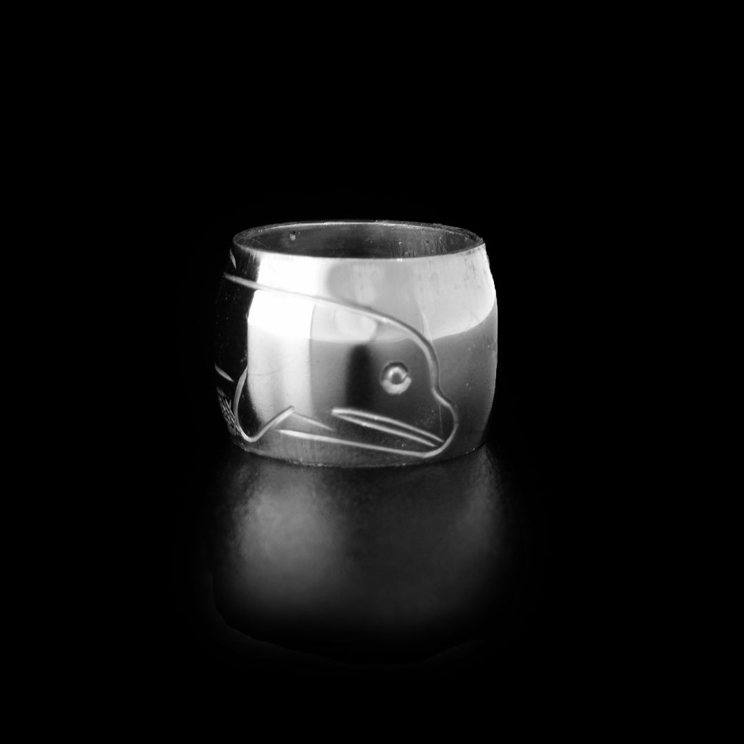 Sterling silver dolphin spirit bead by Coast Salish artist Travis Henry.