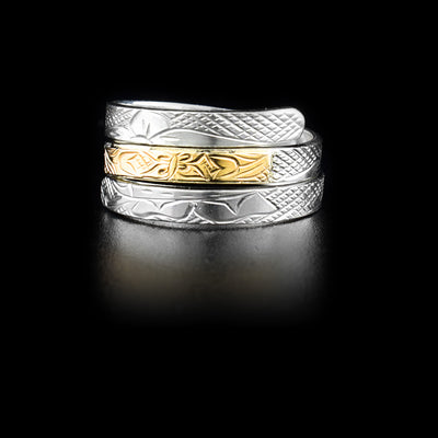 Sterling silver triple wrap ring featuring flora with butterfly scene done in 14K yellow gold in middle. Hand-carved by Kwakwaka’wakw artist Victoria Harper.
