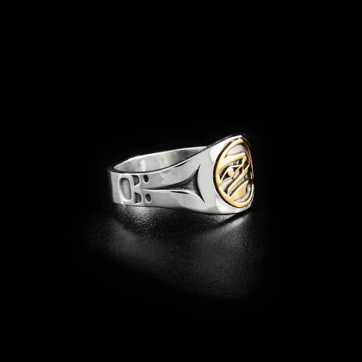 View of right side of ring showing minimalist design along sides.