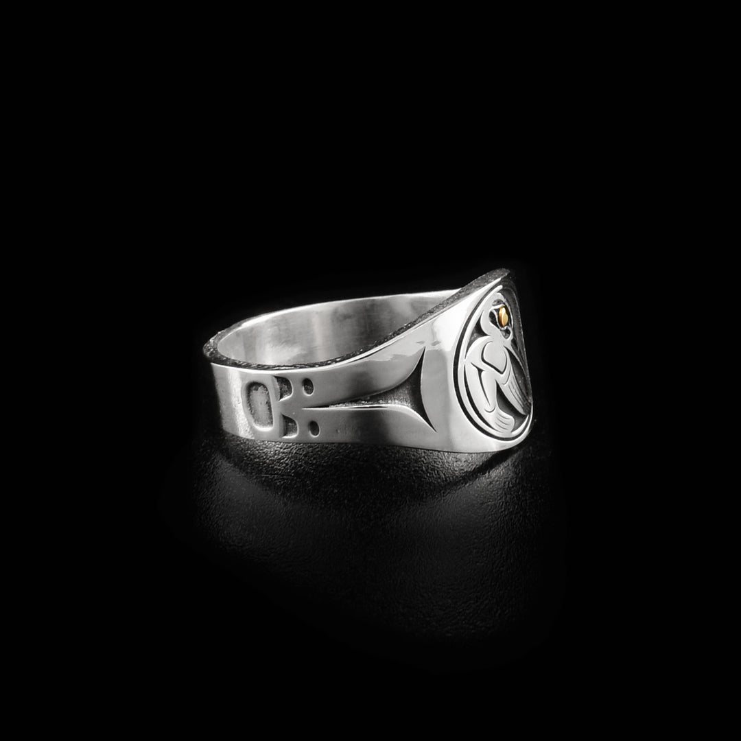 View of right side of ring showing minimalist design along sides.