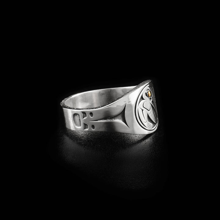 View of right side of ring showing minimalist design along sides.