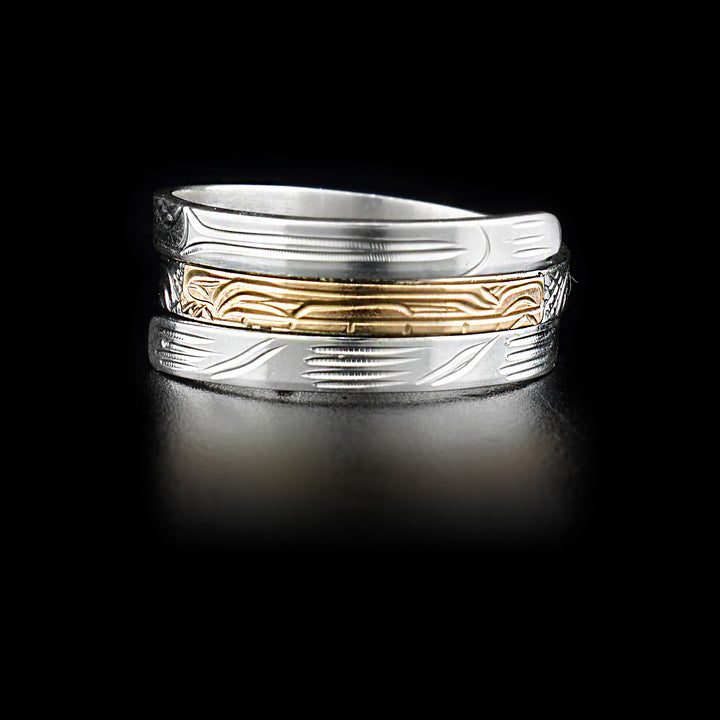 Sterling silver triple wrap ring featuring wolf with face done in 14K yellow gold in middle. Hand-carved by Kwakwaka’wakw artist Victoria Harper.