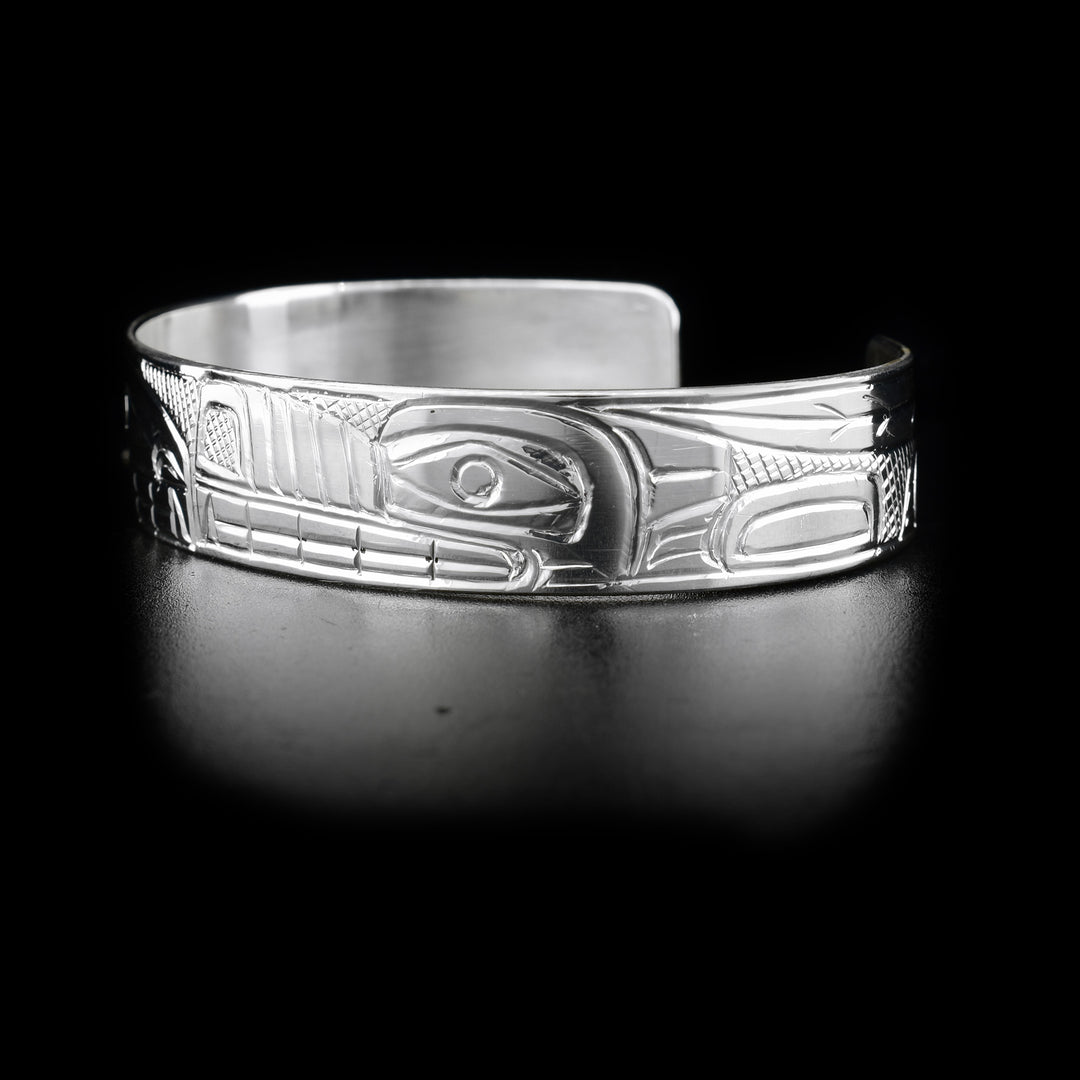 Left side with wolf. Cross-hatching background. Hand-carved by Heiltsuk artist Reg Gladstone.