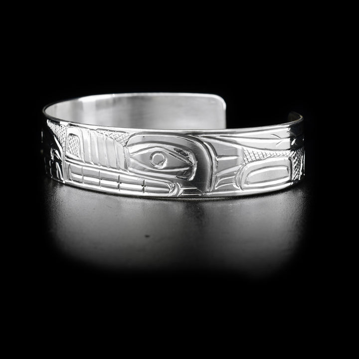 Left side with wolf. Cross-hatching background. Hand-carved by Heiltsuk artist Reg Gladstone.