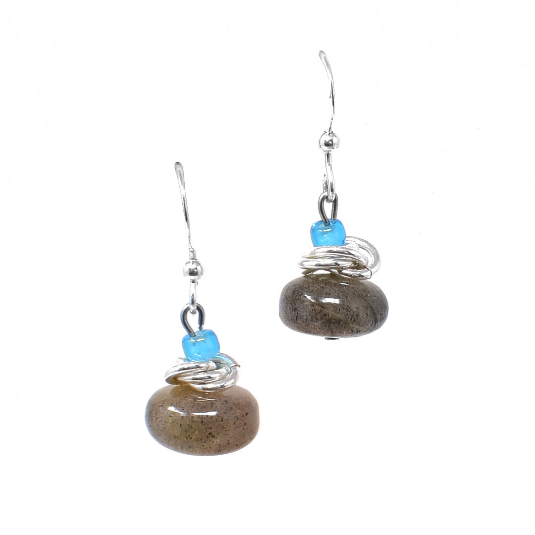 Sterling silver labradorite roundel earrings with interlocking hoops adornments and translucent blue glass beads.