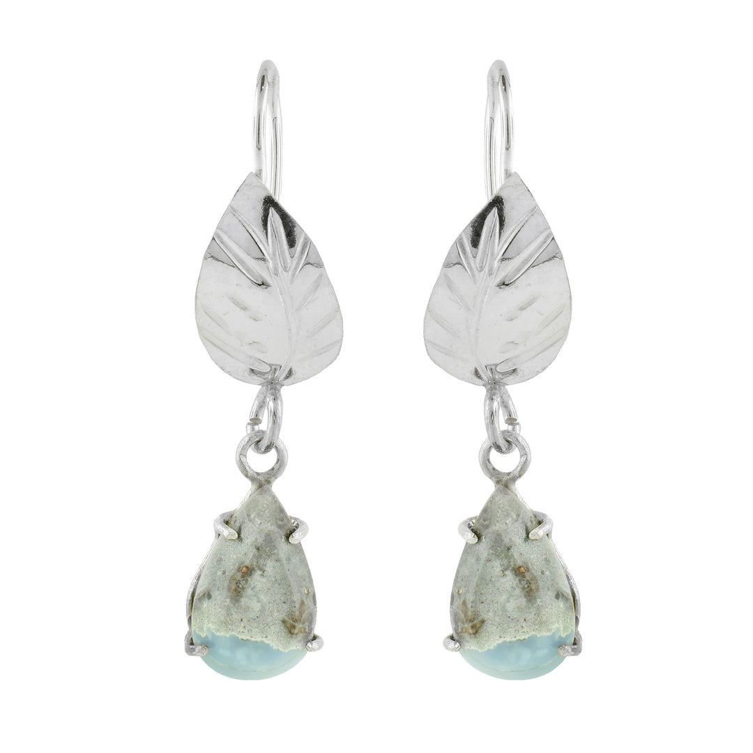 These unique Owyhee opal drop earrings are made from sterling silver and blue opals. The silver hooks have teardrop shaped opal gem hangs on chains.