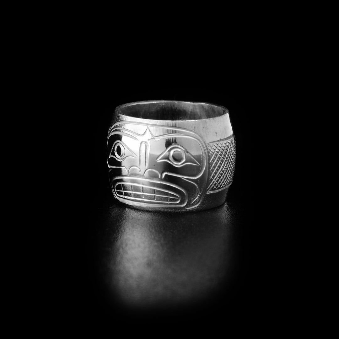 These Moon spirit beads are made from sterling silver and there is a depiction of the Moon carved into the surface of it.