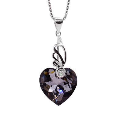 Sterling silver heart shaped silver night Swarovski crystal pendant by artist Debra Nelson.