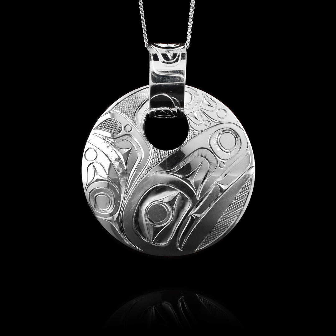 Silver Orca Pendant, Indigenous carved Orca legend with a decorative bail. 