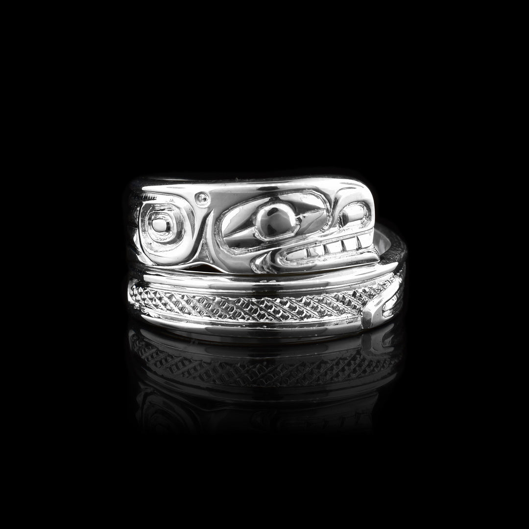 Silver Orca Wrap Ring, The legend of the orca is carved into the wrap ring starting with the head, with details such as the eyes and mouth and as it goes down the ring it forms to the body and cross hatching texture.