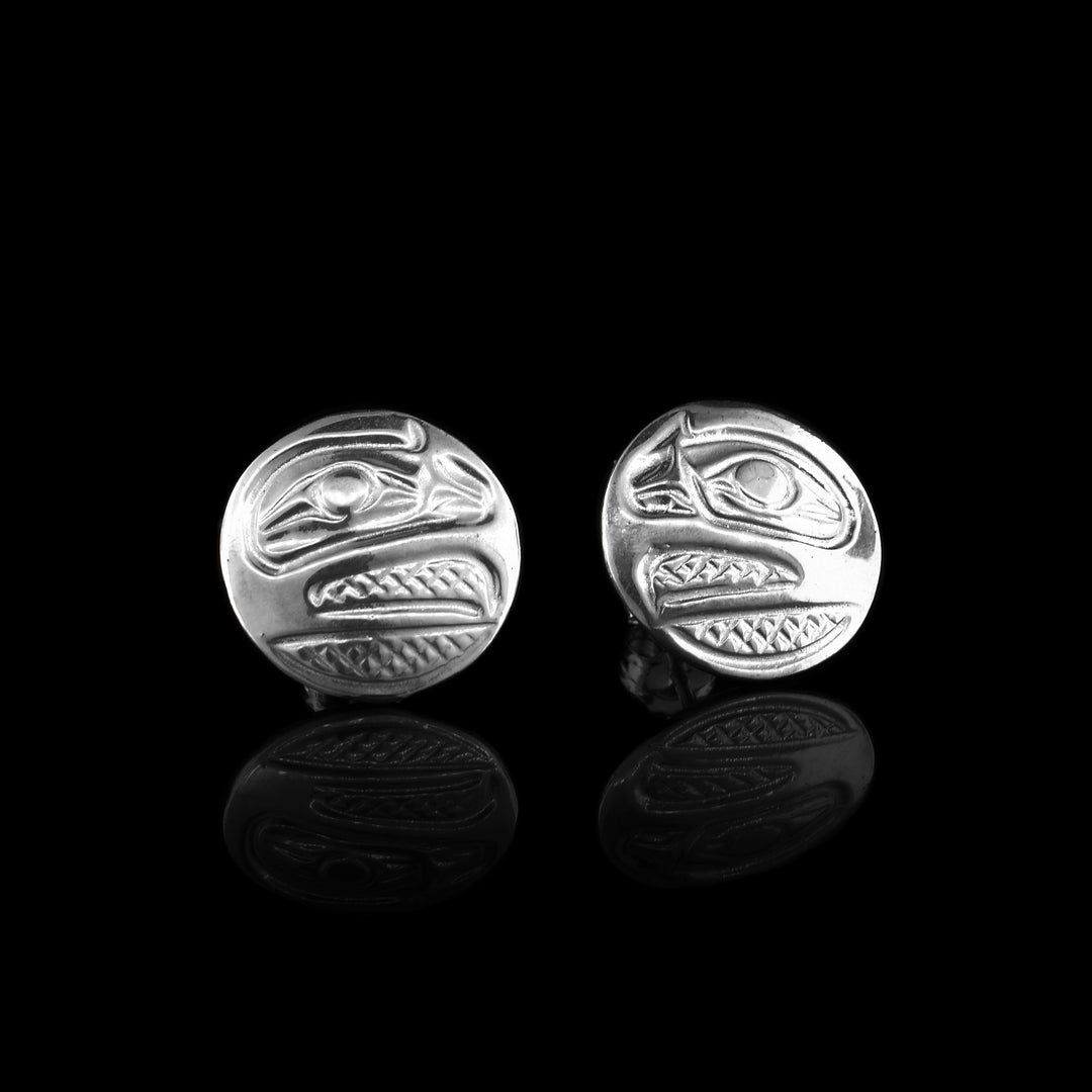 These Silver Raven Studs are made with sterling silver as the legend of the raven casted us into the circular studs.