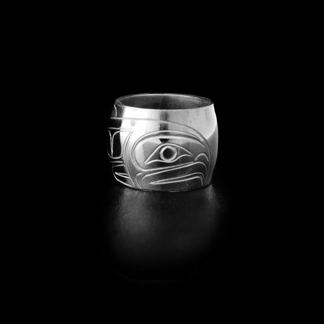 These Salmon spirit beads are made from sterling silver and there is a depiction of the Salmon carved into the surface of them.