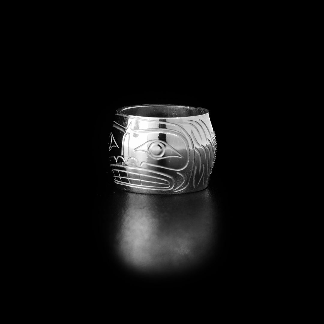 These Sasquatch spirit beads are made from sterling silver and there is a depiction of a sasquatch carved into the surface of it.