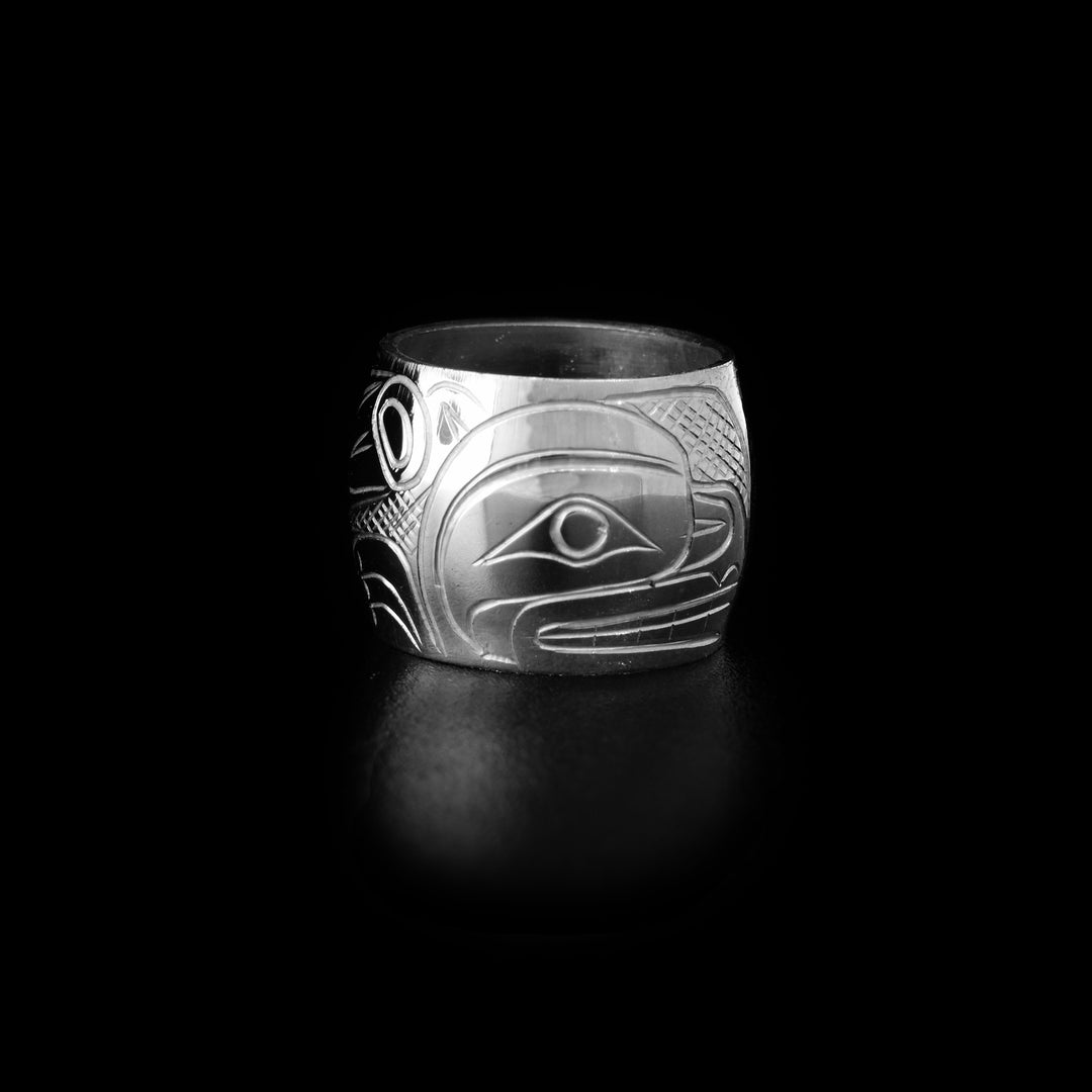 These Otter spirit beads are made using sterling silver and are slightly wide. There is a depiction of the Otter carved into the surface of the bead.