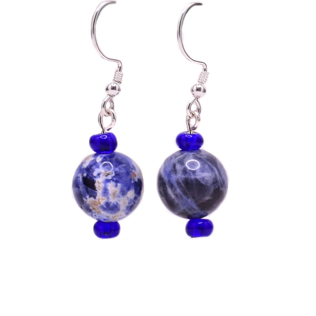 Round, dark sodalite beads with little blue glass beads above and below. Sterling silver hooks.