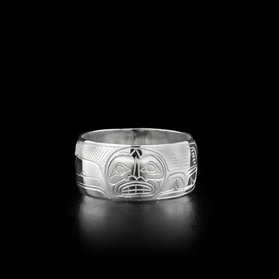 Sterling silver raven and moon ring, 0.38” in width. Hand-carved by Coast Salish artist Travis Henry.