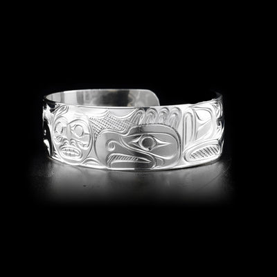 Sterling silver cuff bracelet featuring two eagles and the moon.