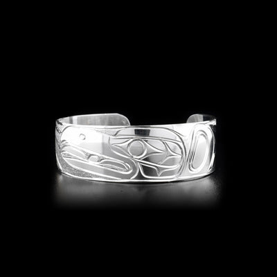 Sterling silver cuff bracelet featuring raven and sun.