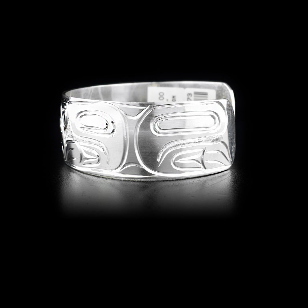 Right side of cuff bracelet featuring bear body.