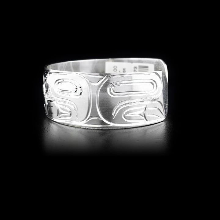 Right side of cuff bracelet featuring bear body.