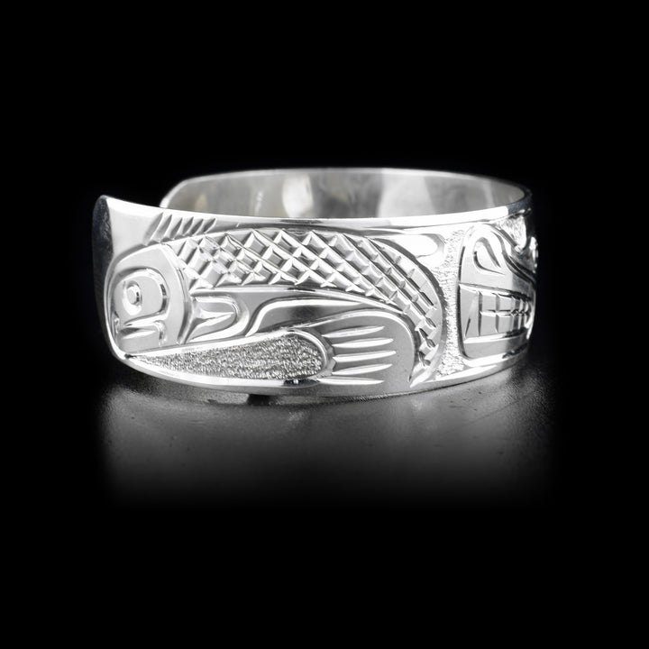 Left side of cuff bracelet featuring salmon.
