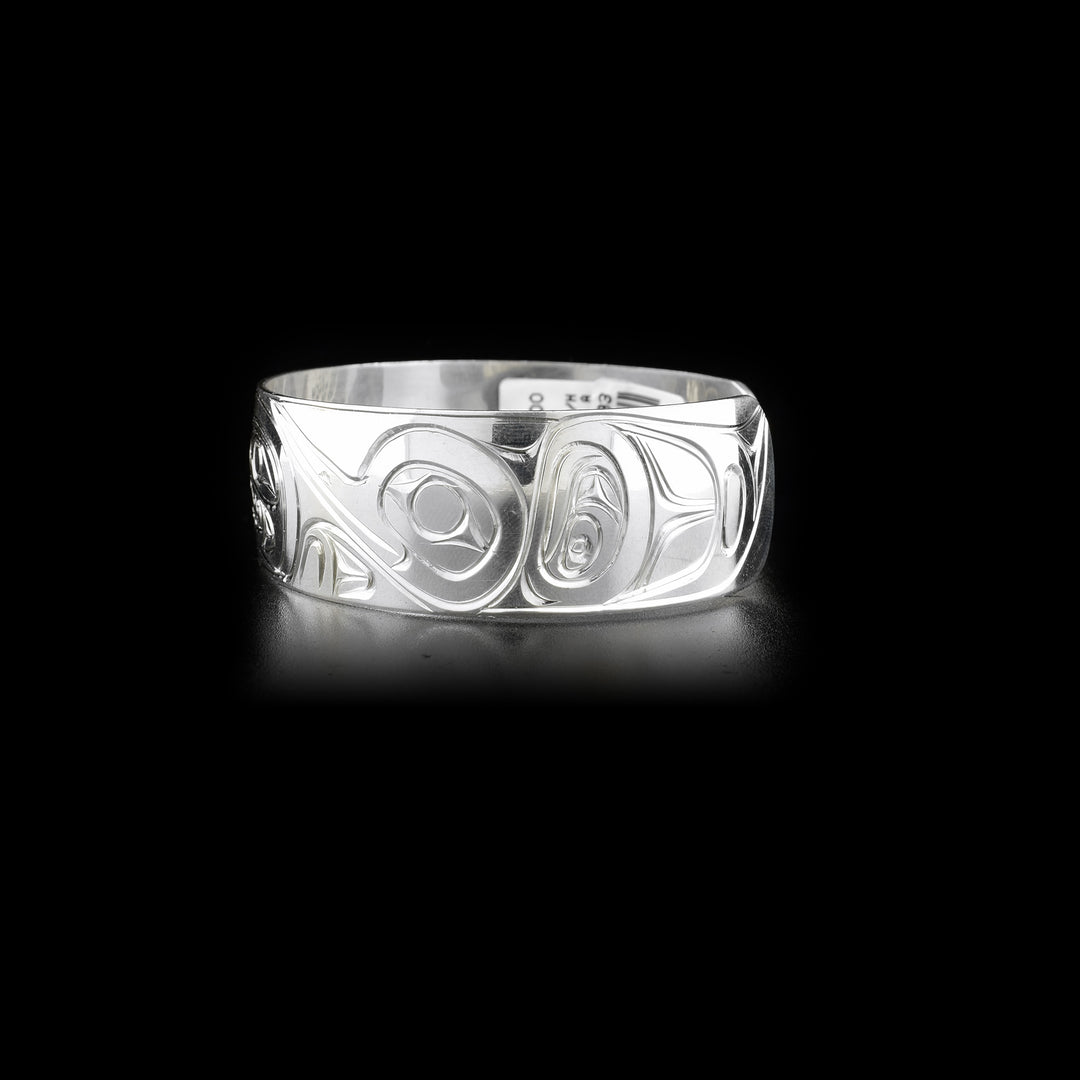 Left side of bracelet featuring side-view of hummingbird.