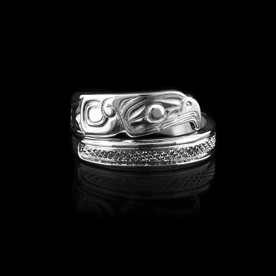 Silver Thunderbird Wrap Ring made with sterling silver the legend of the thunderbird carved into the silver.