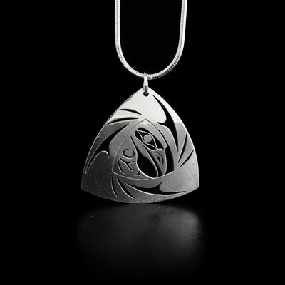 Sterling silver mini pierced triangular raven pendant by Tahltan artist Grant Pauls.
