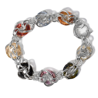 Bracelet is made of interlocking sterling silver rings with Swarovski crystal rings in various colours intertwined as well.