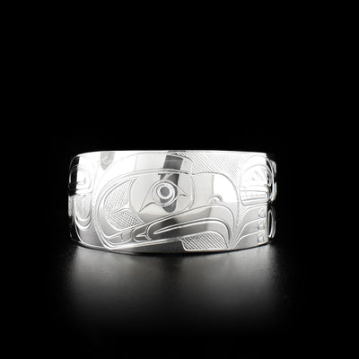 Sterling silver orca and eagle cuff bracelet. One inch wide. Meticulously hand-carved by Coast Salish artist Travis Henry.