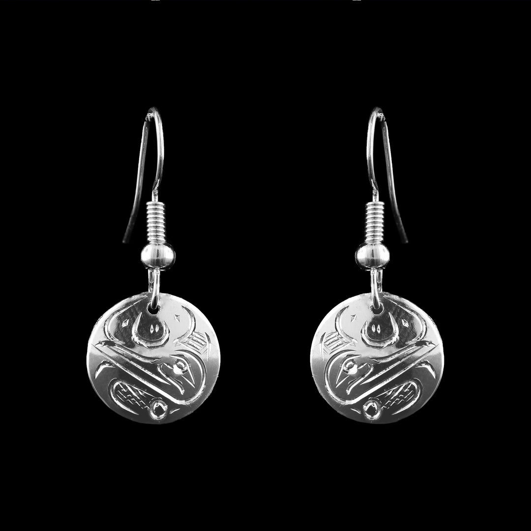 Shop hand-carved sterling silver Hummingbird earrings by Coast Salish artist Graham Henry. Exquisite round disc design featuring traditional Indigenous artistry.