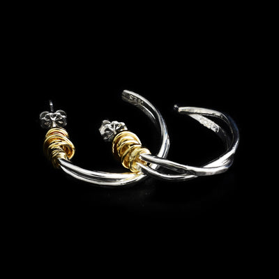 Small twist of fate hoop stud earrings by artist Joy Annett.