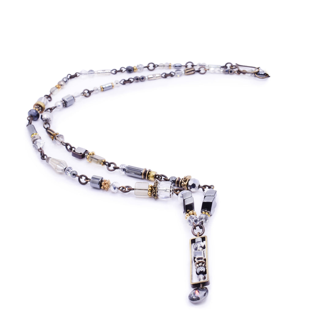 Honica Snowflake Obsidian & Hematine necklace. Handcrafted with Austrian Crystals and antique brass, this 58cm statement piece is true wearable art.