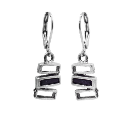 These unique black glass earrings are made up of three cutout, pewter rectangles that are horizontally stacked on top of each other. The middle rectangle is filled with molten black glass.