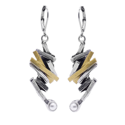 These pewter drop earrings are made from thin, pewter rectangles that connect to each other at different angles and drop down. There are two band of gold plated material on each piece and at the bottom of the hangs are round, Swarovski pearls.