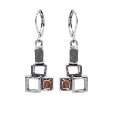These dangling pewter earrings have hangs that consist of three cutout, pewter squares attached to each other. In one of the squares there is a gold, colored glass panel.