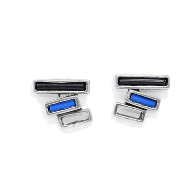 These blue glass earrings studs are made from cutout pewter rectangles. The rectangles are thin and horizontally stacked with the largest at the top. There are (In order) black, blue and white glass in the center of the pewter pieces.