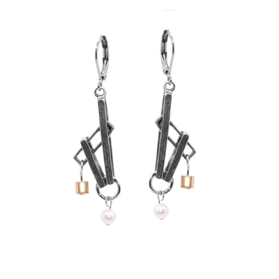 These dangling pearl earrings are made from thin, rectangle pewter pieces that drop down and are connected at different, acute angles. There are pearls dangling at the bottom and a gold plated cube dangling above the pearls at an angle.