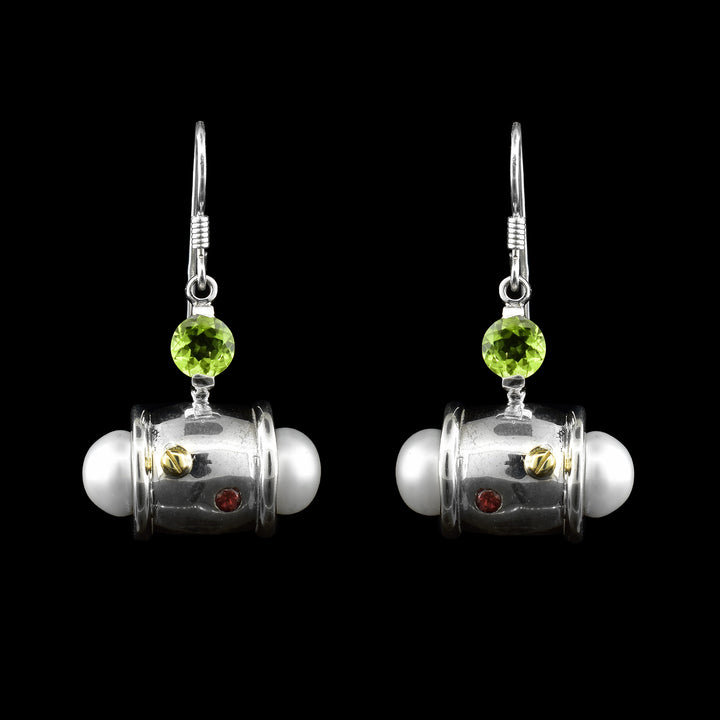handcrafted statement earrings by artist Ivan Dobren. Featuring freshwater pearls, sterling silver, garnet, 14k gold, and vibrant green peridot.