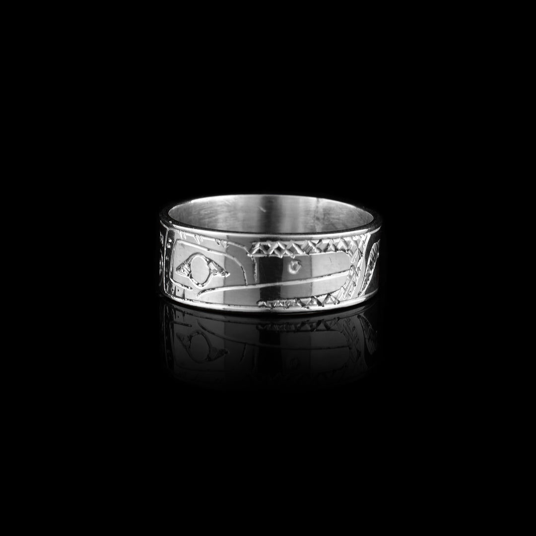 This sterling silver Hummingbird ring has the face of the Hummingbird engraved on it. The face is facing to the right, and the body of the Hummingbird is engraved on the rest of the band.