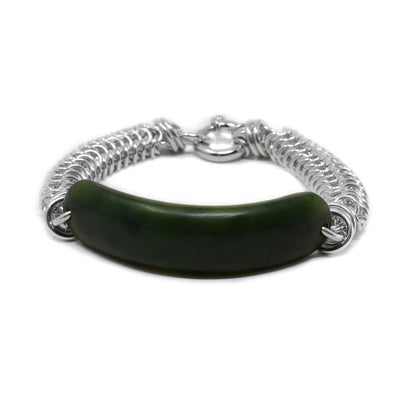 Long, rounded square-oval piece of matte jade with Lisa’s square link chainmalle. Bracelet is made of sterling silver and BC jade.